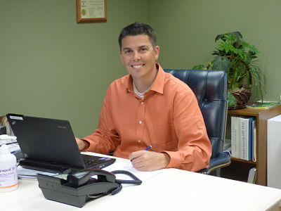 Male employee smiling